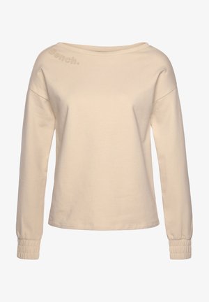 Beige langærmet skjorte med bådudskæring og elastiske manchetter, med diskret præget "Bench." logo nær venstre skulder.