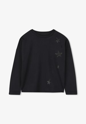 Black long-sleeve shirt in soft fabric featuring metallic star embellishments on one side, round neckline, and relaxed fit.