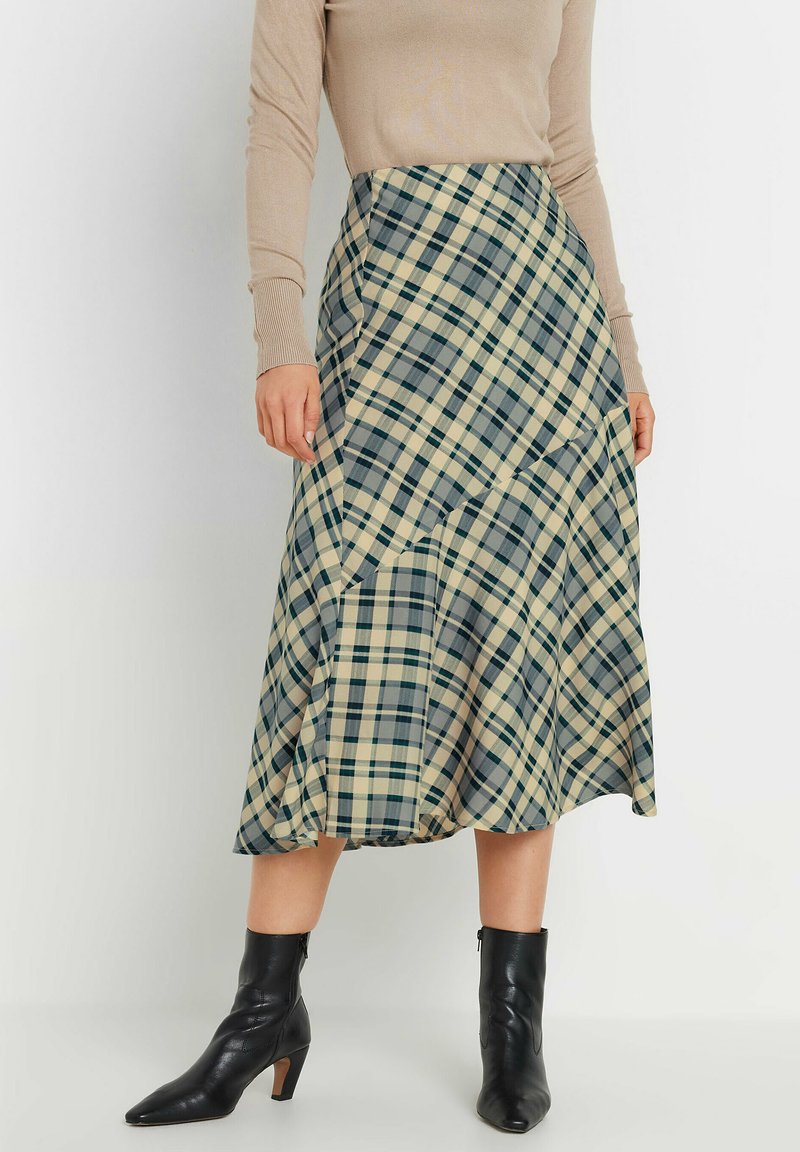 Hame midi panjang yang terbuat dari kain lembut, dengan pola kotak-kotak beige, hijau, dan navy serta siluet A-line dan hem yang melebar.