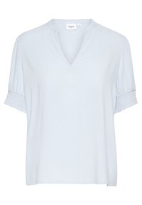 Top blu chiaro a maniche corte con scollatura a V e dettagli arricciati sulle maniche. Texture morbida, vestibilità rilassata, etichetta che recita "Saint."