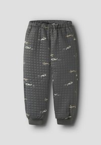 Pantaloni grigi trapuntati con cintura elastica e caviglie cuffiate; presentano un delicato motivo a elicottero su tutta la superficie. Tessuto liscio.