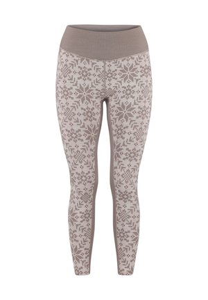 Patroonleggings in beige en bruin tinten. Heeft een hoge, geribbelde tailleband en een geometrisch ontwerp over het geheel. Zachte, rekbare stof.
