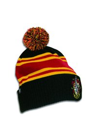 Knit beanie in black with red and yellow stripes. Features a colorful pom-pom on top and an embroidered crest on the front.