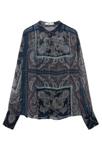 Blouse à manches longues et transparente en bleu foncé avec motif paisley. Dotée d'une fermeture à boutons, d'un col pointu et de poignets contrastants.