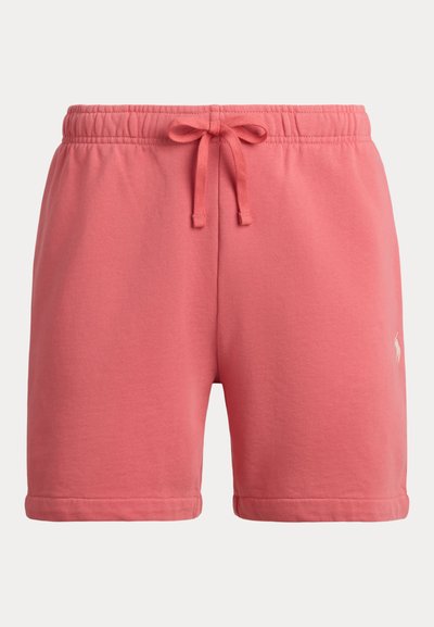 Κοραλλί ροζ σόρτς από βαμβάκι με ελαστική μέση, κορδόνι και τελειώματα στα πόδια. Διαθέτει μικρό λευκό λογότυπο στο κάτω δεξί μέρος.