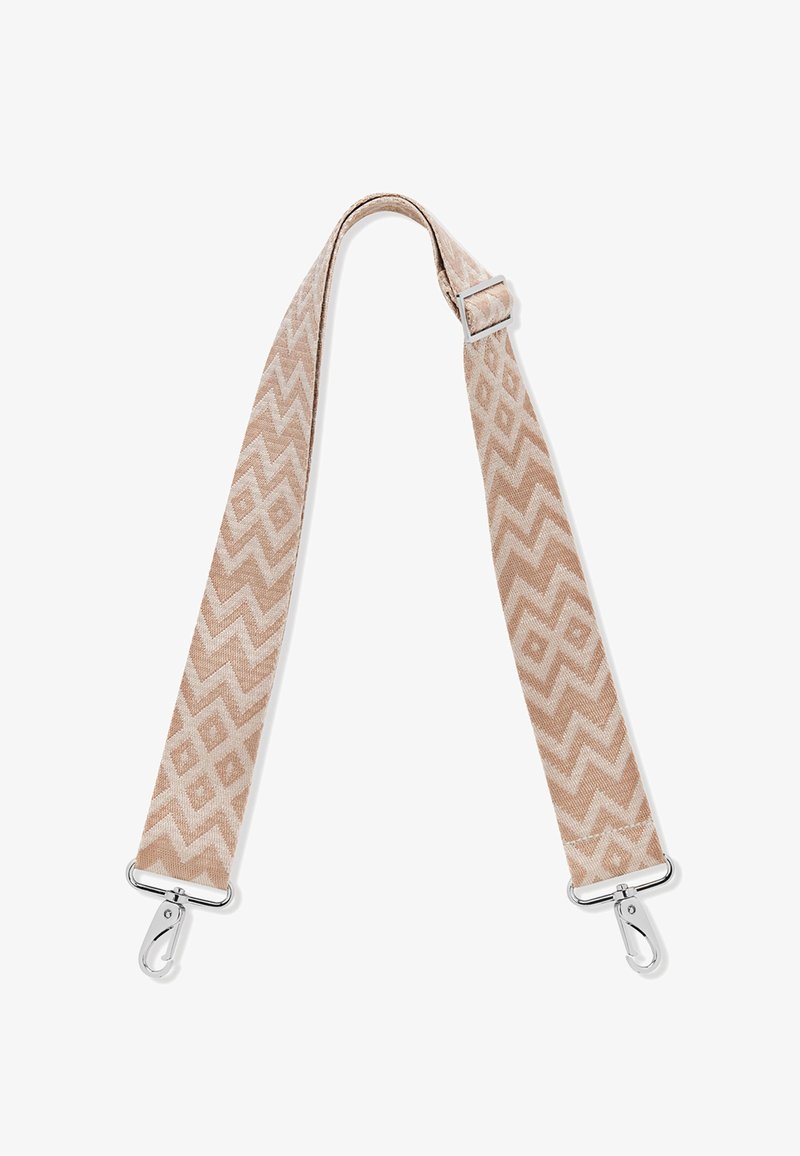 Texturerad tygrem i mjuk beige med ett zick-zackmönster. Utrustad med silverfärgade metallklämmor för fäste. Justerbar längd.