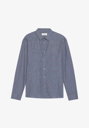 Sinine ja pruun ruuduline pika varrukaga särk, millel on terav krae, nööpidega eest ja üksikud mansetid. Pehme kangas, regulaarne lõige.