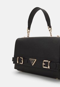 Guess LEVANTE CONVERTIBLE FLAP - Cross body bag - black