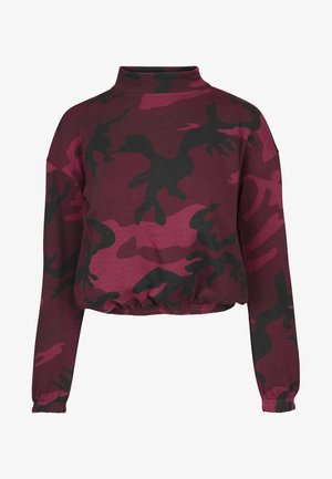 Kratka dukserica v maroon barvi z vzorcem črne in roza kamuflaže, visokim ovratnikom, dolgimi rokavi in elastičnim robom. Mehka tekstura tkanine.