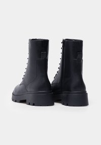 Springfield Stivaletti con plateau - black