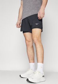 Mizuno CORE SHORT - Pantalón corto de deporte - black