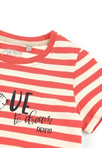 Red and cream striped cotton t-shirt with a round neckline, featuring an illustrated clock and text reading "to dream" and "sigikid."