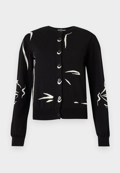 Μαύρο ζακέτα με κουμπιά και μακριά μανίκια, με αφηρημένα λευκά σχέδια με πινέλο στο μπροστινό μέρος και στα μανίκια.