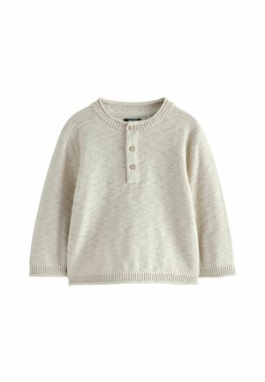 Suéter de punto beige claro con cuello redondo, tapeta de tres botones y puños acanalados. Textura suave y corte relajado.