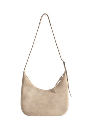 Smėlio spalvos zomšinė petneša rankinė su plonu reguliuojamu dirželiu ir užtrauktuko uždarymu, pasižyminti minimalistiniu dizainu.