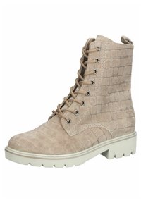 Bottes de cheville en simili cuir beige avec une texture crocodile, dotées de six œillets, d'un laçage et d'une épaisse semelle en caoutchouc blanche.
