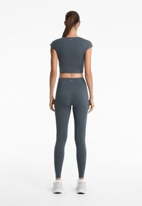 OYSHO LIGHT TOUCH - T-shirt till träning - rose gold coloured
