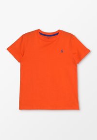 Klarrorange bomulls-t-shirt med rundad halsringning och korta ärmar. Har en liten blå hästlogotyp på bröstet.