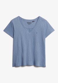 Lysk blue kortærmet V-hals t-shirt lavet af blødt stof, med et lille logo på venstre bryst. Afslappet, løs pasform med lige kant.