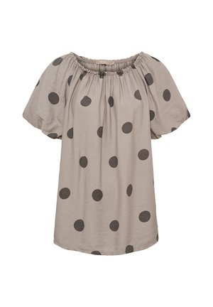 Beige kortærmet bluse med elastisk rund hals og store mørke polkaprikker jævnt fordelt over stoffet.