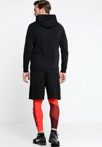 Under Armour RIVAL HOODY - Mikina s kapucí - black/black