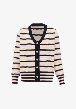 Kötött kardigán V-nyakkal, fekete-fehér csíkozással és öt gombos záródással, virág alakú díszítéssel. Bordás mandzsetta és alja.