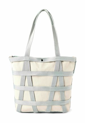 Sac fourre-tout en toile beige avec des sangles verticales et horizontales gris clair, deux anses d'épaule, et une fermeture unique à bouton-pression en haut.