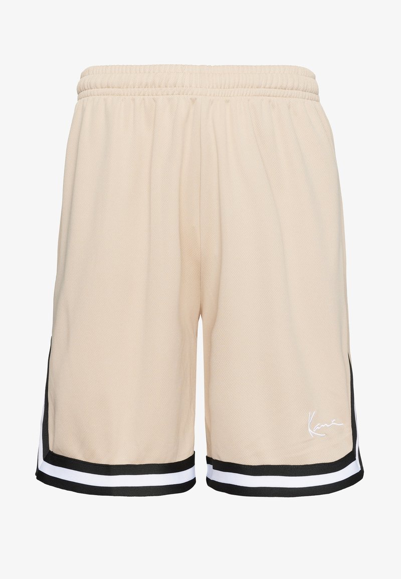 Bež športne hlače z elastičnim pasom, črno-belim črtastim robom na spodnjem delu in majhnim belim napisom na desni nogi.