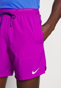 Nike Performance STRIDE - Calções desportivos - vivid purple