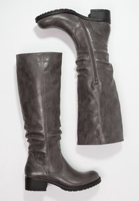 Bottes grises montant jusqu'au genou en similicuir texturé, dotées d'une fermeture éclair latérale, d'un talon bloc et d'un effet froncé en haut.