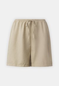 Beige len rövidnadrág elasztikus derékkal, húzózsinórral és laza szabással. Sima textúra, egyszerű szegés.