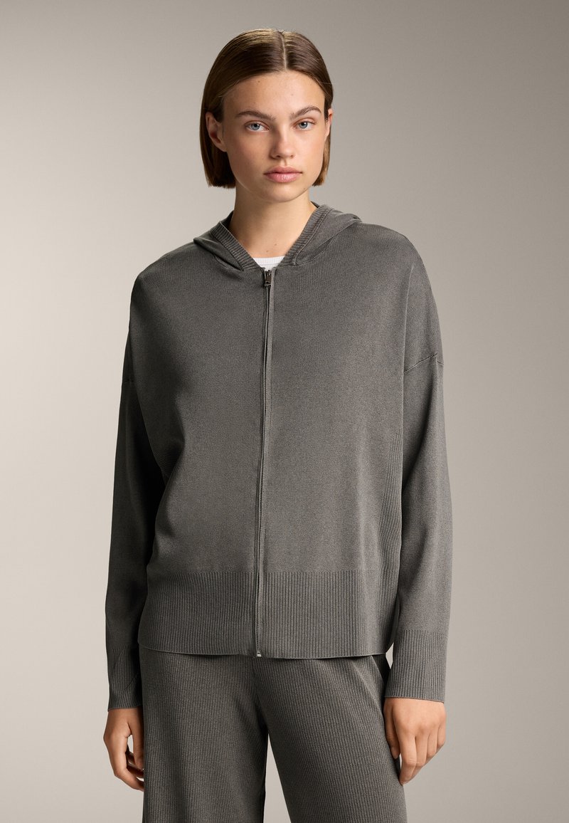 Grau Zip-Hoodie aus strukturiertem Strickstoff, mit Kapuze, gerippten Bündchen und Saum, entworfen für eine lockere Passform.
