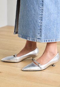 Sélectionné, silver