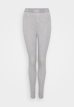 Pelēkas legingi, kas izgatavoti no mīkstas auduma ar pieguļošu dizainu. Iespējams, plata elastīga josta, uz kuras ir gaiši pelēks UGG logo.