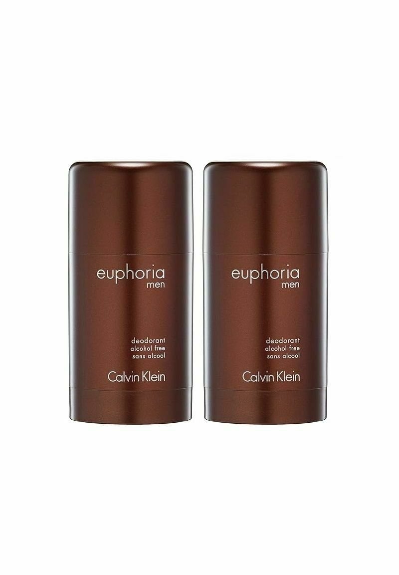 Två bruna, cylindriska deodorantstift märkta "euphoria men" och "alkoholfri" i vit text, med en stilren, matt yta.