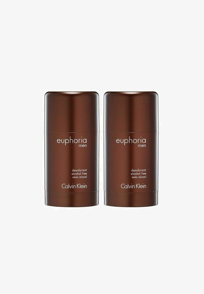 Två bruna, cylindriska deodorantstift märkta "euphoria men" och "alkoholfri" i vit text, med en stilren, matt yta.
