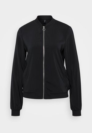 Giacca bomber nera con zip frontale, polsini a coste e scollo rotondo. Materiale morbido con tasche laterali e design aderente.