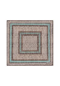 Brun mönstrad matta med concentriska rutor med teal och vita kanter, texturerad yta och vävda designelement.