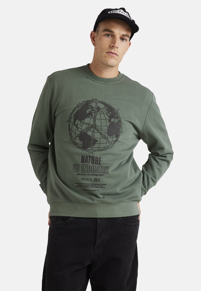 Green sweatshirt featuring a black globe graphic and text "NATURE VS INDUSTRY" on the front. Ribbed cuffs and hem. Cotton blend fabric.