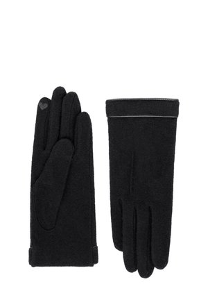 Ein Paar schwarze Winterhandschuhe mit einem kleinen Herzmotiv an einem Finger und dezenten Nähten am Handgelenk.