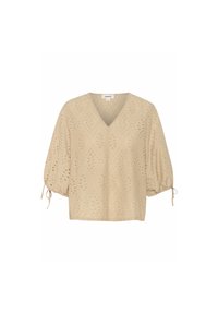 Beige V-neck blouse with short balloon sleeves, featuring diamond patterns and cut-out detailing. Material is lightweight and textured.