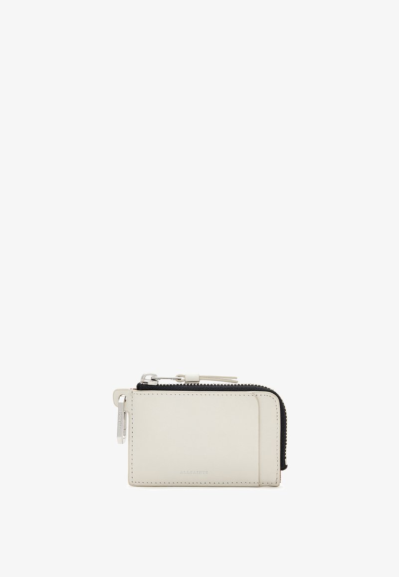 Läderplånbok i ljus krämfärg, med en zippered fack, kortfack och minimal sömdekoration. Slät yta med stilren design.