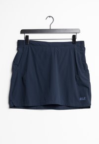 Marinblå lättviktskjol tillverkad av mjukt tyg, med sidofickor och en logotyp. Designad med ett bekvämt elastiskt midjeband för enkel rörelse.