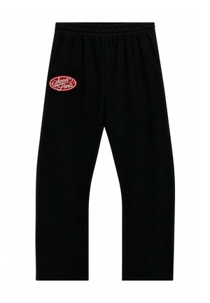 Pantalones deportivos negros con cintura elástica y bolsillos laterales, con una parche ovalado rojo con texto blanco "Sweet Pants" en el muslo izquierdo.