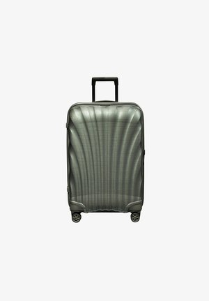 Valigia rigida di colore grigio metallico con texture rigata. Presenta una maniglia retrattile e quattro ruote a scomparsa per una facile mobilità.