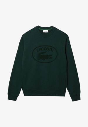 Dunkelgrünes Langarm-Sweatshirt mit Rundhalsausschnitt und einem strukturierten Lacoste-Logo sowie Krokodil-Emblem mittig auf der Vorderseite.
