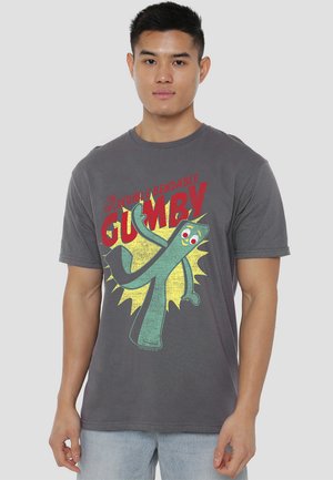 Gray cotton t-shirt featuring a cartoon Gumby graphic in green, yellow, and red with a retro design. Short sleeves and crew neckline.