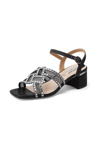 Sandal con tacco nero con design a strisce incrociate, caratterizzato da accenti argentati e un tacco basso a blocco. Texture liscia con punta aperta.