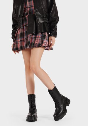 Stivaletti con plateau - nero