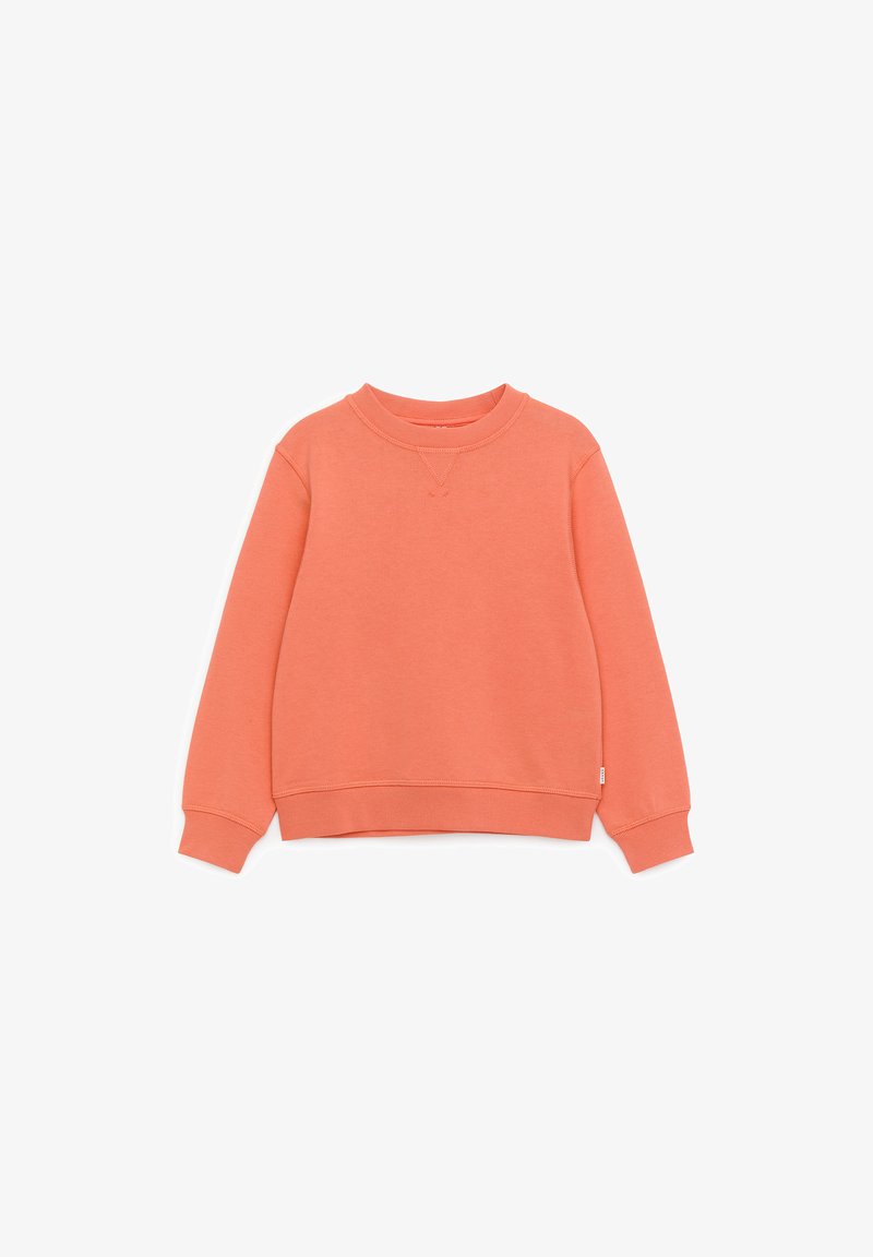 Sweat-shirt corail orange à col rond avec manches longues, poignets et taille côtelés, posé à plat sur un fond blanc.